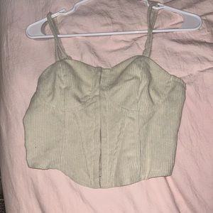 corset like crop top that snaps in the front